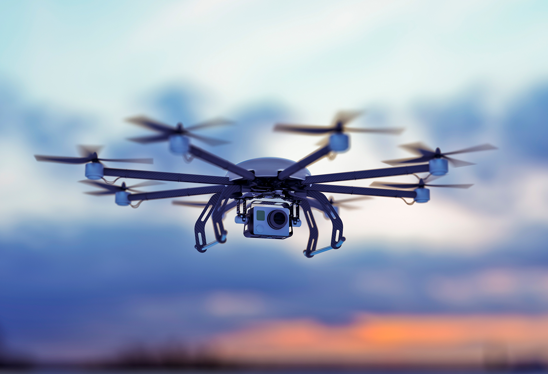 Image of a drone with a camera in the sky