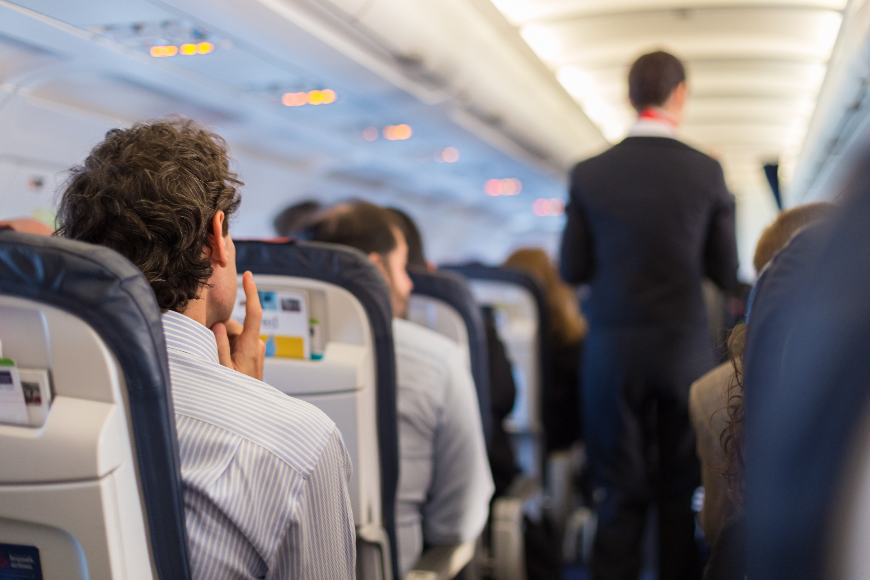 Shot of an aircraft cabin with passengers inside